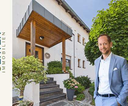 Zweifamilienhaus mit drei Wohnebenen und großem Garten in Erlangen oder doch ein Neubau