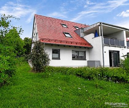 Altersgerecht & komfortabel wohnen: Erdgeschosswohnung mit Sonnenterrasse, Garten und Garage