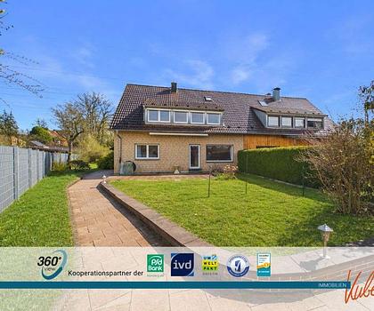 IMMO KUBE! Teilsaniertes Zweifamilienhaus mit großem Garten und Doppelgarage in Winkelhaid