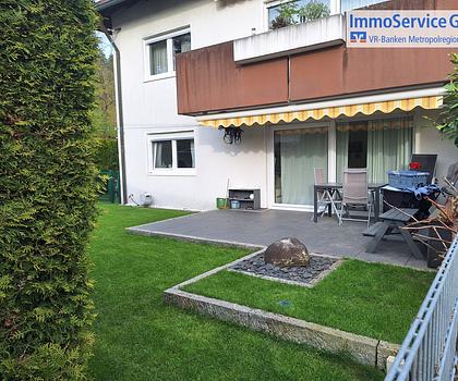 Kapitalanlage mit Gartenidylle – Vermietete, top sanierte 3-Zimmer-Erdgeschosswohnung mit Garage