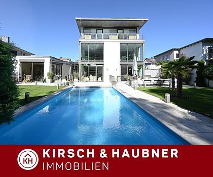 EXKLUSIVE FAMILIENVILLA -
HERAUSRAGENDES DESIGN & MODERNSTE TECHNIK